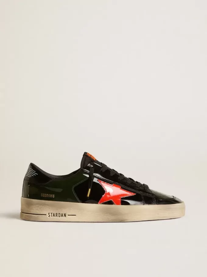 Herren-Sneaker Stardan LAB aus schwarzem und grünem Lackleder mit orangefarbenem Stern