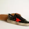 Herren-Sneaker Stardan LAB aus schwarzem und grünem Lackleder mit orangefarbenem Stern