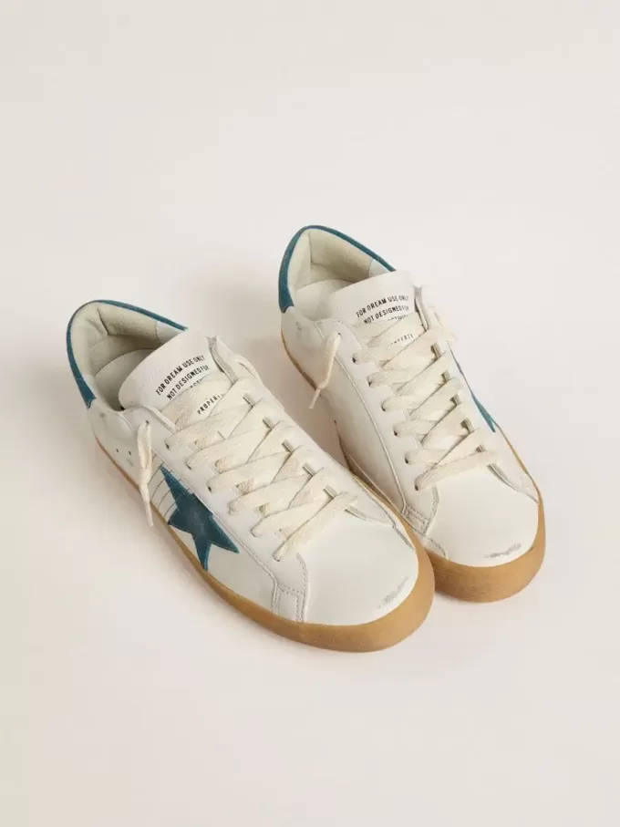 Herren-Super-Star aus Leder mit petrolblauem Wildlederstern und Fersenlasche Herren-Super-Star aus Leder mit petrolblauem Wildlederstern und Fersenlasche
