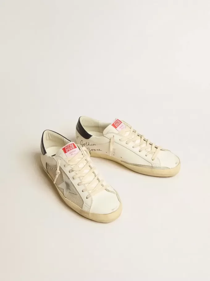 Herren-Super-Star LTD aus Mesh und Leder mit silbernem Stern und blauer Fersenlasche Herren-Super-Star LTD aus Mesh und Leder mit silbernem Stern und blauer Fersenlasche