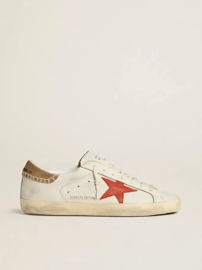 Herren-Super-Star LTD aus Nappaleder mit orangefarbenem Lederstern und tabakfarbenem Wildleder-Fersenlasche Herren-Super-Star LTD aus Nappaleder mit orangefarbenem Lederstern und tabakfarbenem Wildleder-Fersenlasche