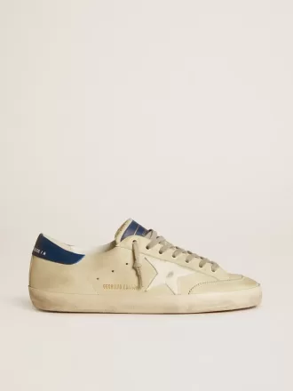 Herren-Super-Star LTD aus Nubukleder mit weißem Lederstern und blauer Fersenlasche Herren-Super-Star LTD aus Nubukleder mit weißem Lederstern und blauer Fersenlasche