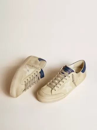 Herren-Super-Star LTD aus Nubukleder mit weißem Lederstern und blauer Fersenlasche Herren-Super-Star LTD aus Nubukleder mit weißem Lederstern und blauer Fersenlasche