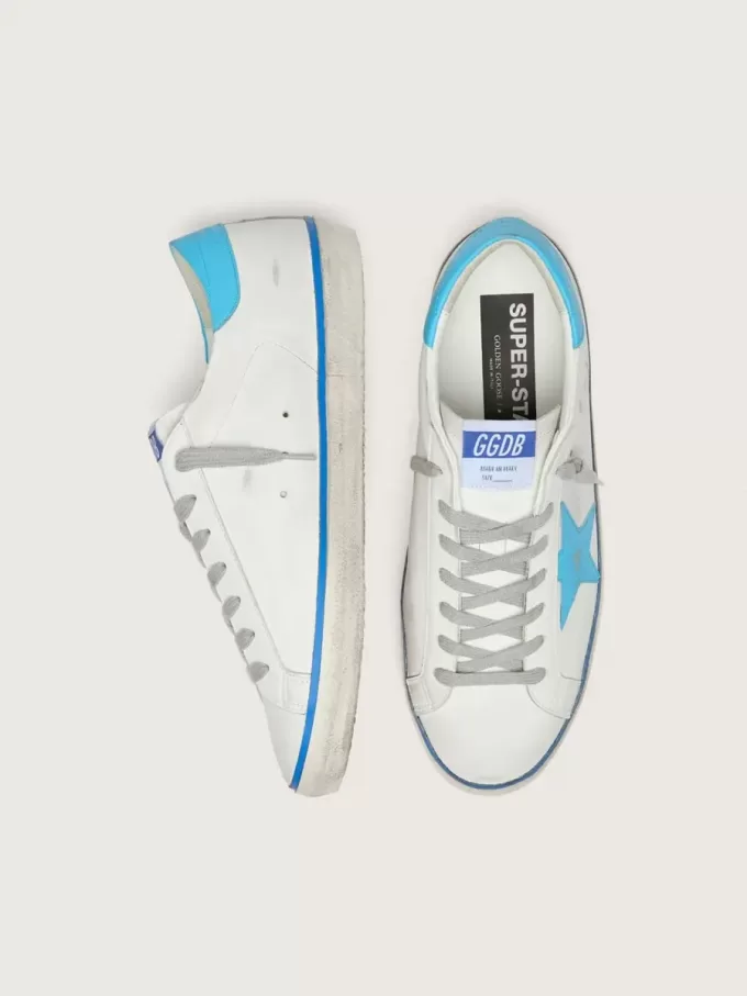 Herren-Super-Star LTD aus weißem Leder mit hellblauem Lederstern und Fersenlasche Herren-Super-Star LTD aus weißem Leder mit hellblauem Lederstern und Fersenlasche
