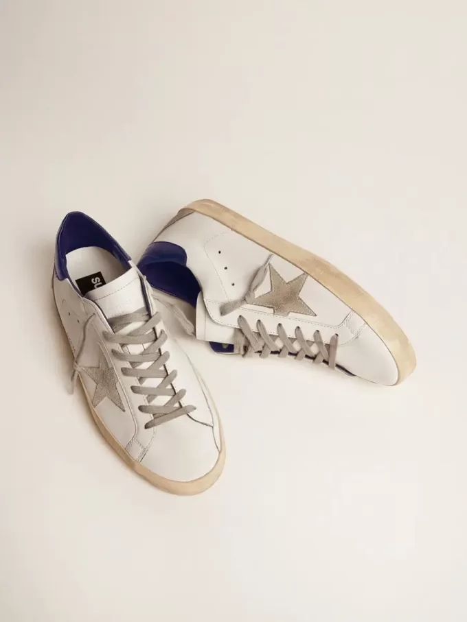 Herren-Super-Star mit Wildlederstern und blauer Fersenlasche Herren-Super-Star mit Wildlederstern und blauer Fersenlasche