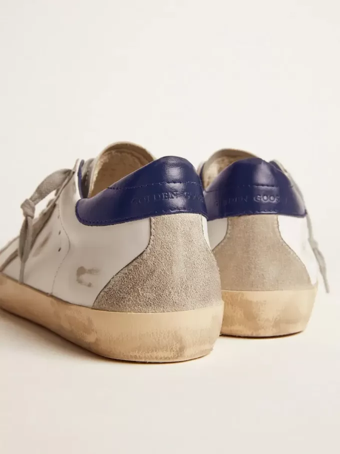 Herren-Super-Star mit Wildlederstern und blauer Fersenlasche Herren-Super-Star mit Wildlederstern und blauer Fersenlasche