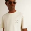 Herren-T-Shirt aus Baumwolle in Altweiß mit Aufdruck auf der Brust Herren-T-Shirt aus Baumwolle in Altweiß mit Aufdruck auf der Brust