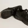 Herrenmodell Lightstar mit schwarzem Obermaterial aus Leder und Mesh und schwarzem Stern