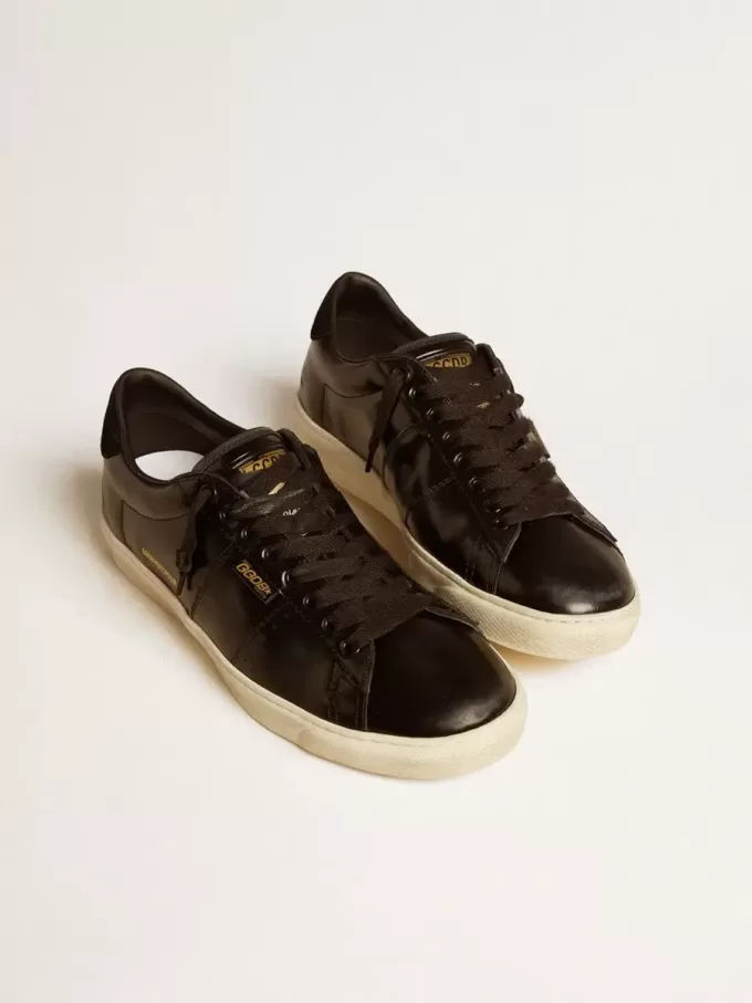 Herrenmodell Matchstar aus schwarzem Leder mit Fersenlasche aus schwarzem Wildleder Herrenmodell Matchstar aus schwarzem Leder mit Fersenlasche aus schwarzem Wildleder