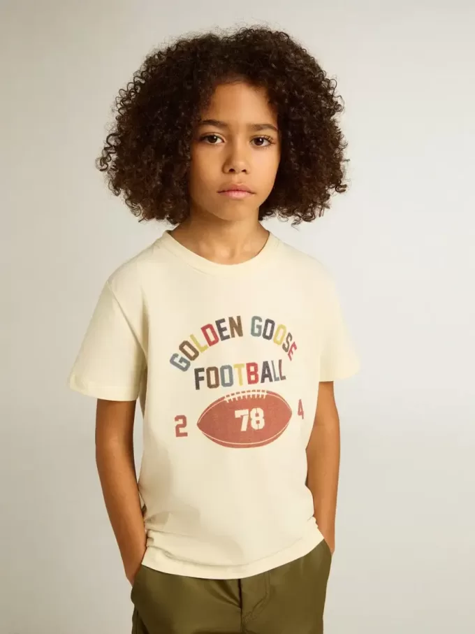 Jungen-T-Shirt in Used-Weiß mit mehrfarbigem Schriftzug Jungen-T-Shirt in Used-Weiß mit mehrfarbigem Schriftzug