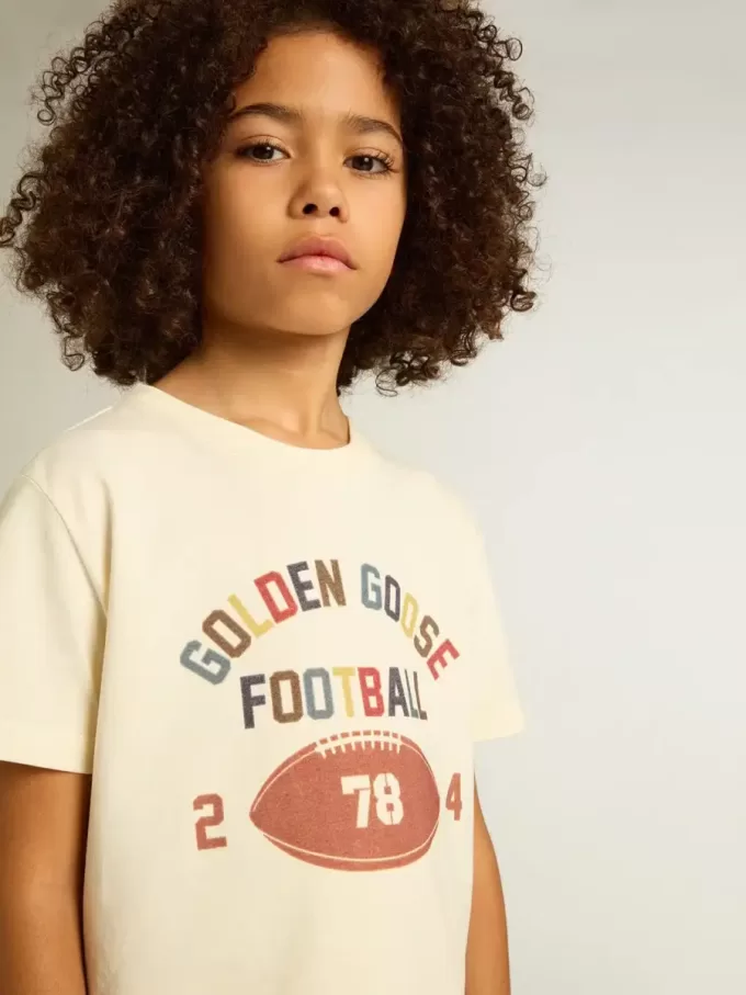 Jungen-T-Shirt in Used-Weiß mit mehrfarbigem Schriftzug Jungen-T-Shirt in Used-Weiß mit mehrfarbigem Schriftzug