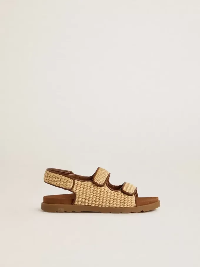 Junior-Sandalen „Noa” aus beigem Raffia und braunem Leder Junior-Sandalen „Noa” aus beigem Raffia und braunem Leder