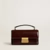 Kleine Venezia-Tasche aus dunkelbraunem laminiertem Leder mit goldenen Details