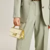 Kleine Venezia-Tasche aus goldfarbenem Metallic-Leder mit goldenen Details