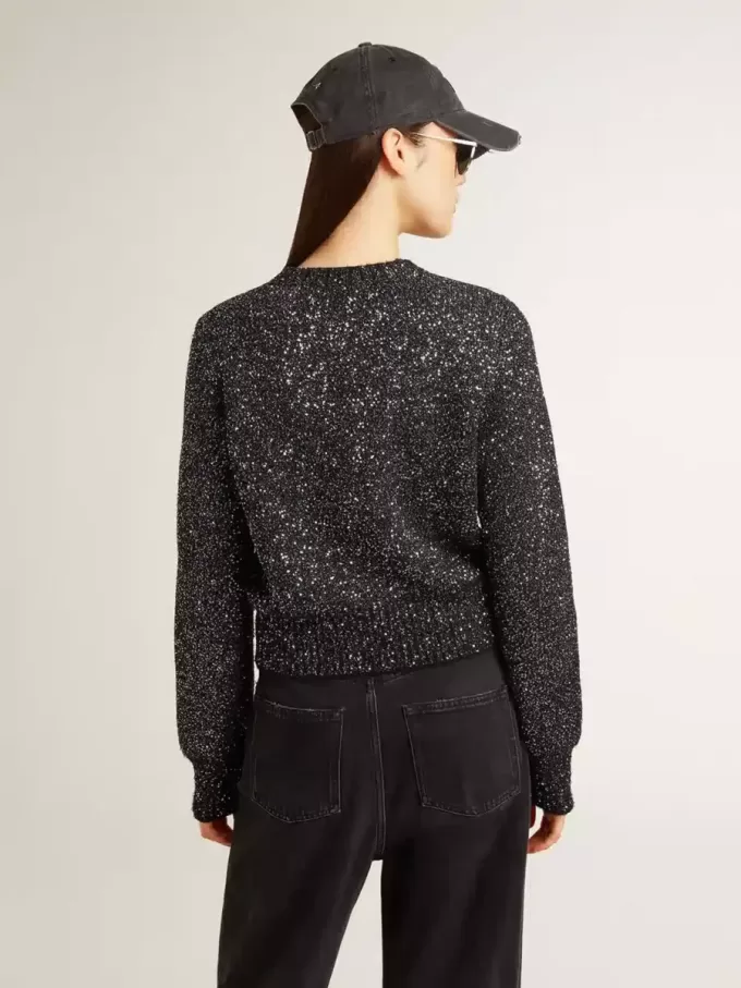 Kurzer Damenpullover aus schwarzer Wollmischung mit durchgehenden Pailletten Kurzer Damenpullover aus schwarzer Wollmischung mit durchgehenden Pailletten