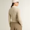 Kurzer Pullover mit Rundhalsausschnitt aus beiger Wolle mit Kristallverzierung