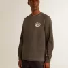 Langärmliges Herren-T-Shirt aus anthrazitgrauer Baumwolle mit Logo auf der Rückseite Langärmliges Herren-T-Shirt aus anthrazitgrauer Baumwolle mit Logo auf der Rückseite