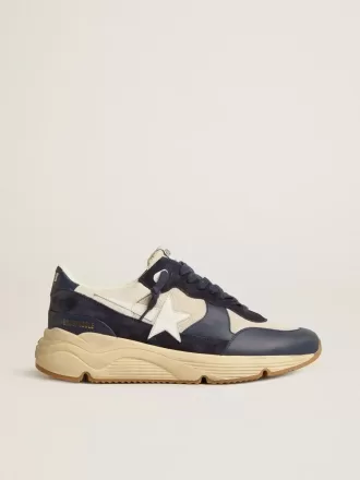 Laufsohle aus cremefarbenem Mesh und blauem Leder mit weißem Lederstern Laufsohle aus cremefarbenem Mesh und blauem Leder mit weißem Lederstern