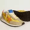 Marathon für Damen mit gelbem Nylon-Obermaterial und orangefarbenem Stern Marathon für Damen mit gelbem Nylon-Obermaterial und orangefarbenem Stern