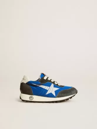 Marathon Junior aus blauem Nylon mit aufgedrucktem Stern und Lederlasche an der Ferse