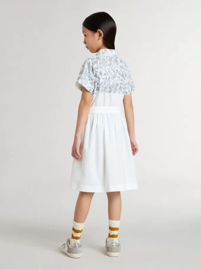 Mädchen-Hemdkleid aus weißer Baumwoll-Canvas mit blauem Marineprint und weißer Paspelierung