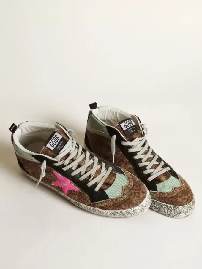 Mid Star aus Ponyfell mit Leopardenmuster und fuchsiafarbenem Lederstern Mid Star aus Ponyfell mit Leopardenmuster und fuchsiafarbenem Lederstern