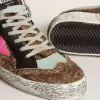 Mid Star aus Ponyfell mit Leopardenmuster und fuchsiafarbenem Lederstern Mid Star aus Ponyfell mit Leopardenmuster und fuchsiafarbenem Lederstern