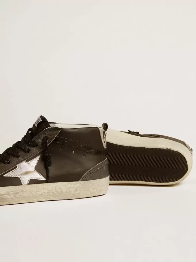 Mid Star für Damen aus schwarzem Leder mit silbermetallischem Lederstern