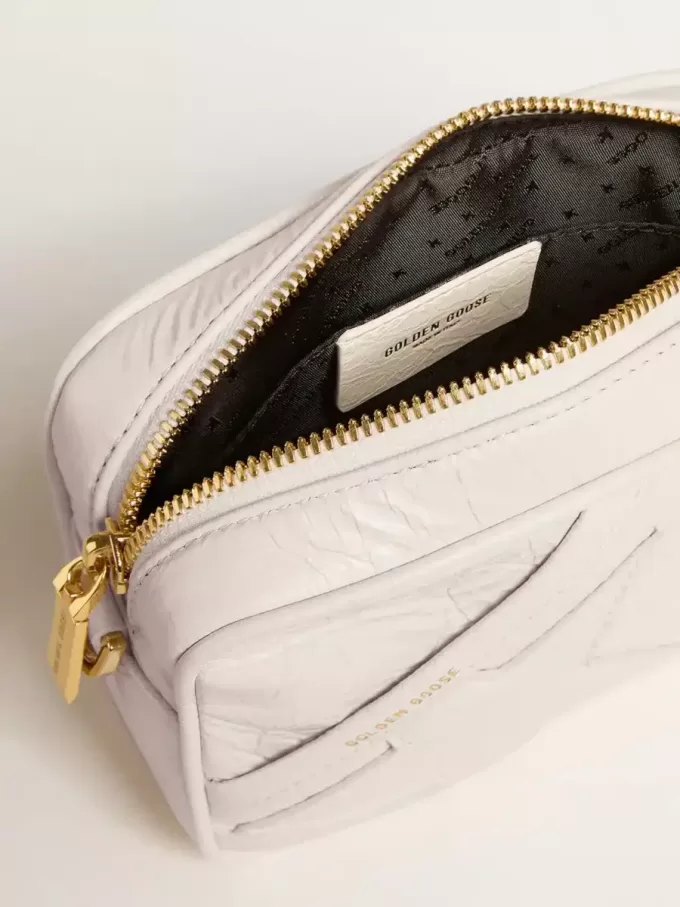 Mini Star Bag aus butterweißem Leder mit Ton-in-Ton-Stern Mini Star Bag aus butterweißem Leder mit Ton-in-Ton-Stern