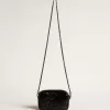 Mini Star Bag aus schwarzem Leder mit Swarovski-Kristallstern Mini Star Bag aus schwarzem Leder mit Swarovski-Kristallstern