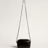 Mini Star Bag aus schwarzem Leder mit Swarovski-Kristallstern Mini Star Bag aus schwarzem Leder mit Swarovski-Kristallstern