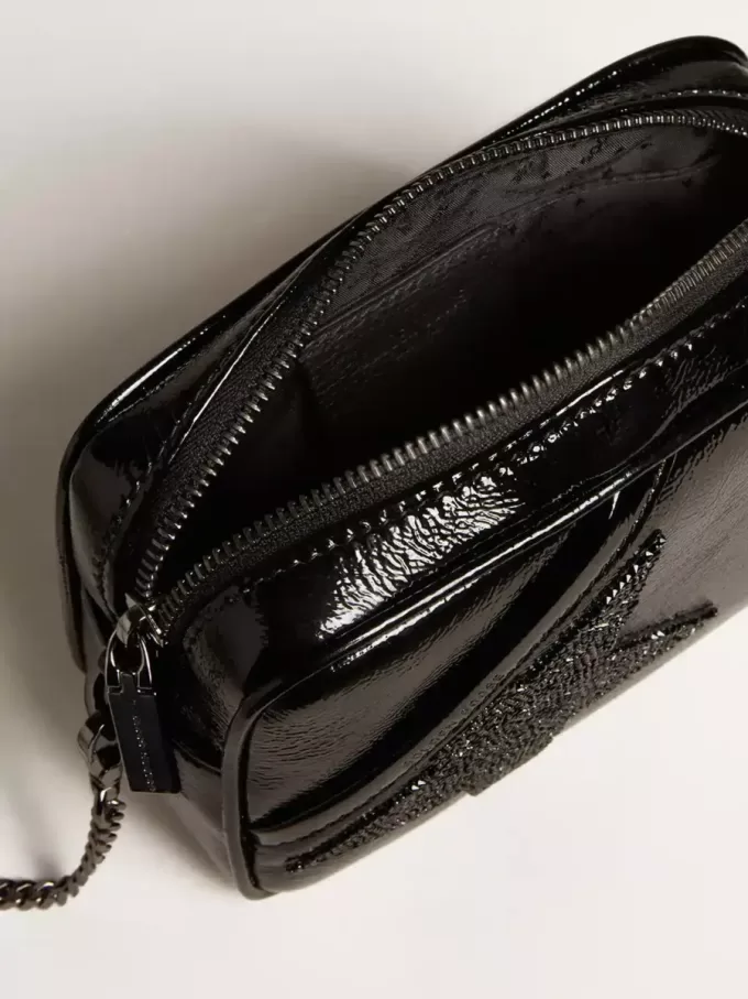 Mini Star Bag aus schwarzem Leder mit Swarovski-Kristallstern Mini Star Bag aus schwarzem Leder mit Swarovski-Kristallstern