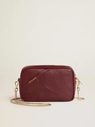 Mini Star Bag aus weinrotem Leder mit farblich abgestimmtem Stern