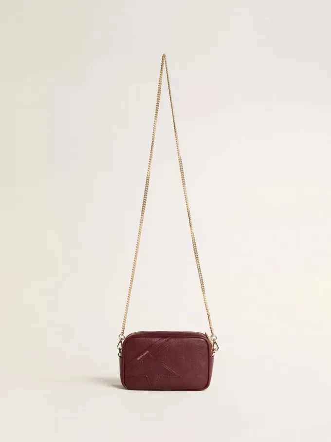 Mini Star Bag aus weinrotem Leder mit farblich abgestimmtem Stern