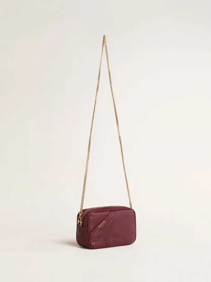 Mini Star Bag aus weinrotem Leder mit farblich abgestimmtem Stern