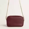 Mini Star Bag aus weinrotem Leder mit farblich abgestimmtem Stern
