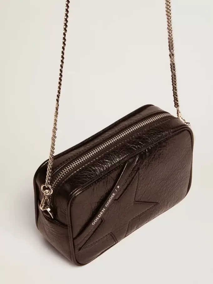 Mini Star Bag für Damen aus schwarzem Glanzleder mit farblich abgestimmtem Stern Mini Star Bag für Damen aus schwarzem Glanzleder mit farblich abgestimmtem Stern