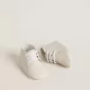 New Born Sneakers aus weißem Leder mit perforiertem Stern New Born Sneakers aus weißem Leder mit perforiertem Stern