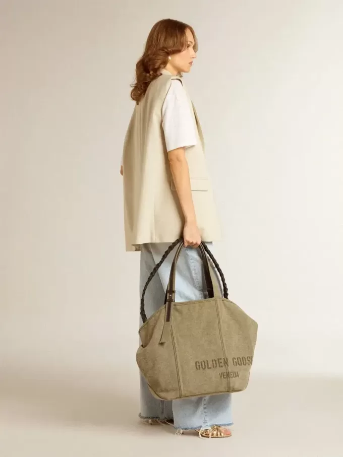 Nico Kitten-Heel-Sandalen aus metallisch goldenem Leder Nico Kitten-Heel-Sandalen aus metallisch goldenem Leder