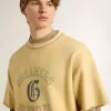 Oversized-T-Shirt für Herren aus gelber Baumwolle mit blauem Print Oversized-T-Shirt für Herren aus gelber Baumwolle mit blauem Print