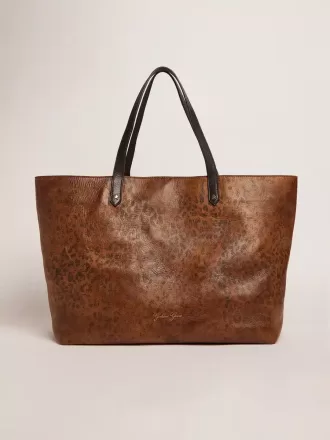 Pasadena-Tasche aus gehämmertem Leder mit Leopardenmuster und kontrastierenden schwarzen Griffen Pasadena-Tasche aus gehämmertem Leder mit Leopardenmuster und kontrastierenden schwarzen Griffen