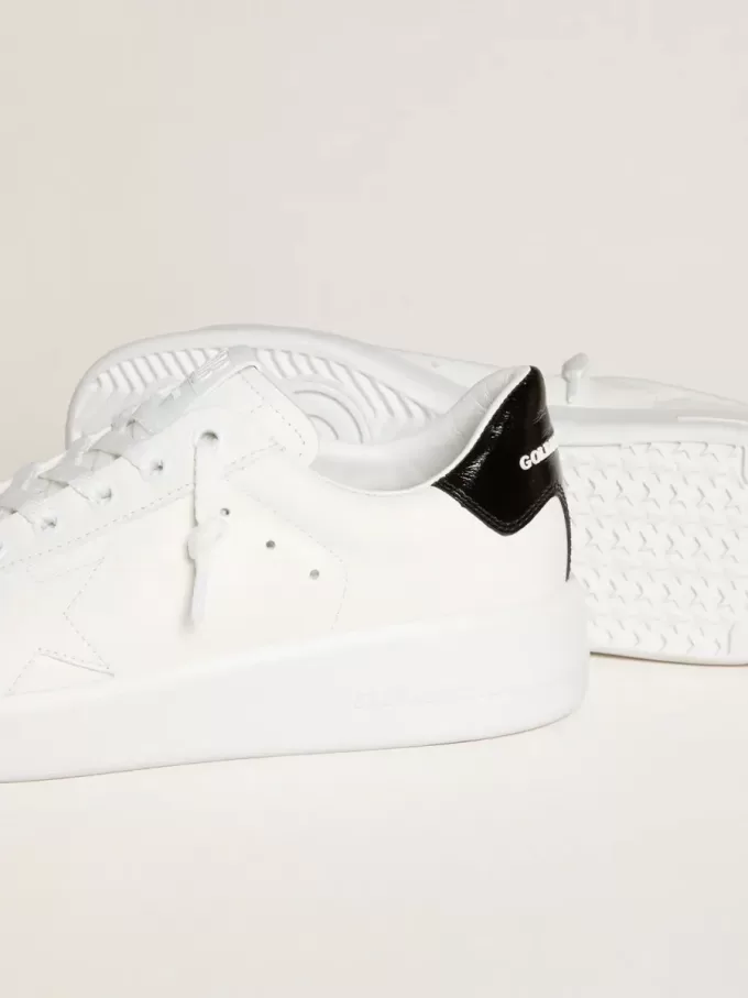Purestar für Damen mit Lederstern und schwarzer Lackleder-Fersenlasche Purestar für Damen mit Lederstern und schwarzer Lackleder-Fersenlasche