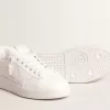 Purestar mit weißem Stern aus biobasiertem Material und mattschwarzer Lederlasche an der Ferse Purestar mit weißem Stern aus biobasiertem Material und mattschwarzer Lederlasche an der Ferse