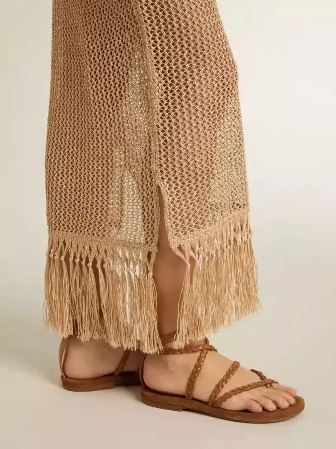 Ärmelloses Midikleid für Damen aus beigem Häkelstoff mit Fransen Ärmelloses Midikleid für Damen aus beigem Häkelstoff mit Fransen
