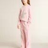 Rosa Sweatshirt mit großem Stern in silbernem Glitzer auf der Vorderseite