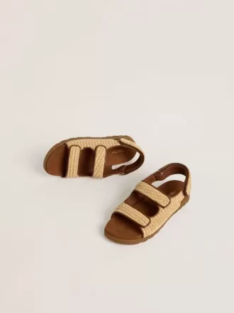 Sandalen „Young Noa” aus beigem Raffiabast und braunem Leder