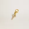 Schlüsselanhänger aus goldfarbenem Messing mit Kristallen
