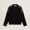 Schwarze Herrenjacke aus Merinowolle mit Lederaufnähern Schwarze Herrenjacke aus Merinowolle mit Lederaufnähern
