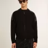 Schwarze Herrenjacke aus Merinowolle mit Lederaufnähern Schwarze Herrenjacke aus Merinowolle mit Lederaufnähern