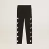 Schwarze Leggings für Mädchen mit weißen Sternen an den Seiten Schwarze Leggings für Mädchen mit weißen Sternen an den Seiten